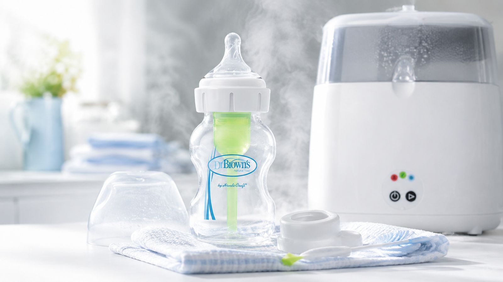Dr Brown's bottle with a sterilizer sitting on the kitchen counter